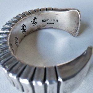 Vtg Sterling Silver NAVAJO Michael Slim Bear Tracks Mega Cuff Bracelet 232 G